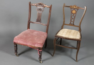 A late Victorian Sheraton revival mahogany low seat salon chair  with pierced splat above a stuff-over seat on shaped legs, together  with a similar Victorian chair