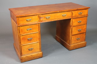 A Victorian Aesthetic oak pedestal desk fitted 1 long and 8 short drawers with brass swan neck drop handles 29"h x 48"w x 21"d