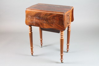 A 19th Century Continental shaped mahogany drop leaf work table, of serpentine form, fitted a cupboard and 2 short drawers,  raised on turned and reeded legs 28"h x 22"w x 14"d