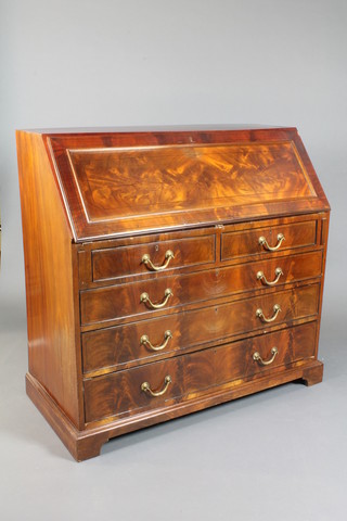 An Edwardian inlaid mahogany bureau, the fall enclosing a  fitted interior above 2 short and 3 long drawers with brass swan  neck handles, raised on bracket feet 41"h x 42"w x 20"d