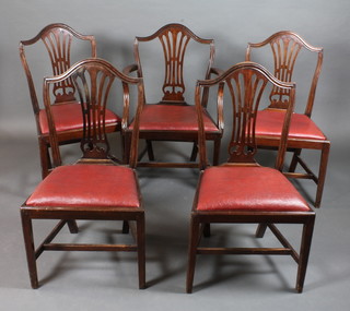 A set of 5 19th Century mahogany dining chairs in the  Hepplewhite style, one having arms with pierced vase splats,  drop in seats on square legs