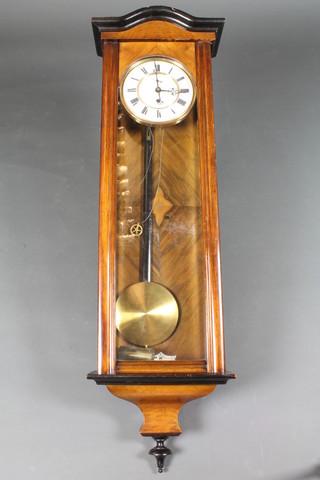 A 19th Century stained beech and walnut cased Vienna wall regulator, having Roman chapter ring and second subsidiary dial, set 8 day movement 41"h x 13"w