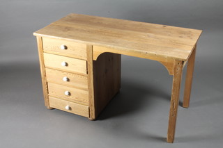A stripped and polished pine desk fitted 5 drawers with ceramic tore handles 43"w x 21"d x 25"h