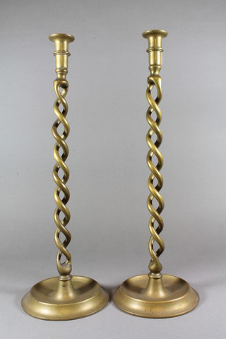 A pair of brass spiral candlesticks 20"h
