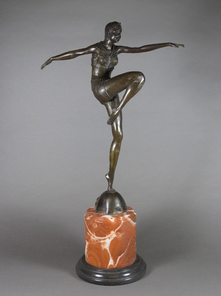 An Art Deco style bronze figure of a dancing lady raised on a  socle marble base 23"