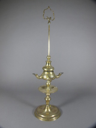 An Eastern brass 4 light oil lamp 25"