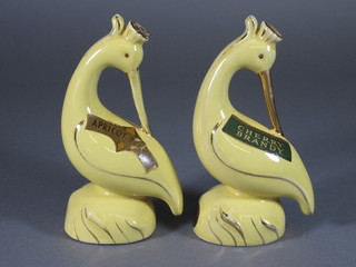 2 pottery flasks in the form of birds containing cherry and apricot brandy 7"