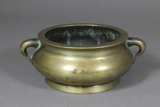 A Chinese circular bronze twin handled incense burner, the base with seal mark 5"  ILLUSTRATED