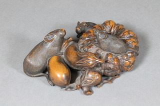 A Japanese Meji period carved fruitwood figure group of 3 rats  with fruit 5", tail f,  ILLUSTRATED