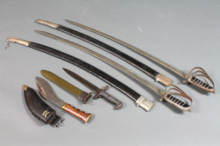 An American bayonet, a reproduction Kukri and sheath together  with 2 reproduction Indian sabres