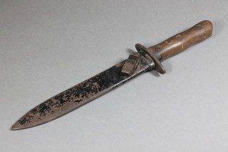 A dagger with 8" blade complete with metal scabbard