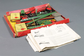 A quantity of various red and green Meccano