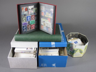A red stock book of various stamps, a green album of stamps, a  shoe box containing a collection of first day covers, a tin of loose  stamps and 1 other of PQ cards