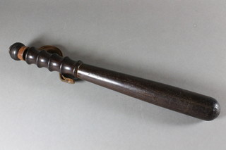 A late Victorian turned treen truncheon with leather lanyard, 16"