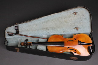 A violin with 15" back complete with bow in fibre carrying case