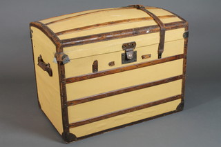 A French canvas and wooden bound steamer cabin trunk 25"h x  34"w x 21"d