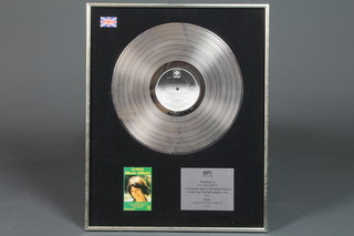 A Pye Records "silver" record disc to Lena Martell, awarded by  Pye Records in recognition of the sale of the United Kingdom  300,000 copies of the Pye album Lena's Music album 1979