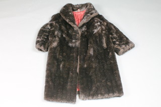 A lady's Mini Barmink simulated fur coat