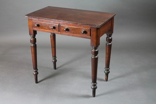 A Victorian mahogany side table fitted 2 short drawers, raised on turned supports 30"w x 18"d x 29"h