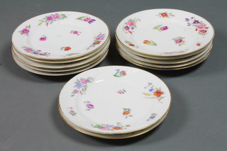 A set of 12 floral patterned porcelain plates 8"