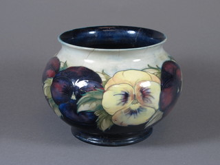 A Moorcroft blue glazed jardiniere decorated pansies, cracked,  the base with signature mark 5"