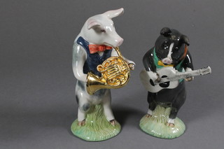 A Beswick Pottery Pig Promenade Figure, Sinclairs exclusive limited edition of 2000 figure - Thomas Guitarist PP11 no.  386/2000, together with Benjamin French Horn PP12 no.  449/2000, boxed