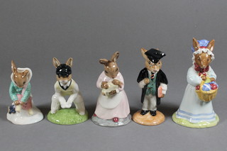 5 Royal Doulton Bunnykins Figures of the Year comprising Girl Skater DB153, Wicket Keeper DB150, Mother/Baby Bunny,  School Master DB60 and Easter Parade DB19, boxed