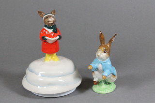 A Royal Doulton Bunnykins musical box Boite a Musique and a Beswick Bunnykins figure - Peter Rabbit with gold backstamp  marked F Warne & Co, boxed