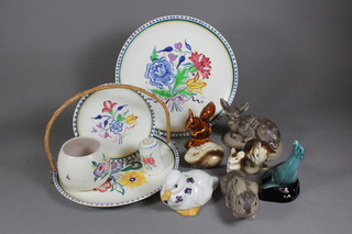8 various Poole Pottery figures of animals, a Poole Pottery floral patterned plate 10" diam. do. cake stand 9", plate 6", squat vase  3" and a pepper pot 2"
