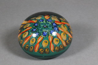 A 19th Century circular glass paperweight 2.5"