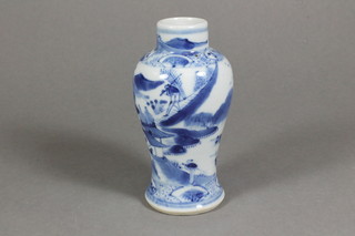 A Chinese blue and white vase decorated figures by buildings 5"