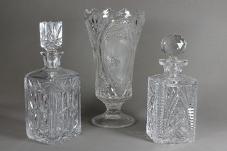 2 cut glass spirit decanters and a cut glass vase 12"