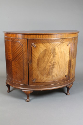 A George III style mahogany commode, fitted panelled door,  raised on cabriole supports 39"h x 48"w x 21"d