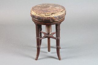 A Victorian circular mahogany adjustable piano stool, raised on turned supports, 20"h x 13" diam.