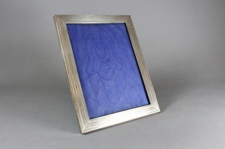A silver easel photograph frame with engine turned decoration,  London 1911, 9" x 7.5"