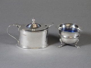 A circular silver salt Birmingham 1919 and a silver mustard pot Sheffield, 3 ozs