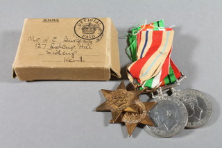A group of 3 medals comprising Africa Star, Italy Star, Defence  and War medal