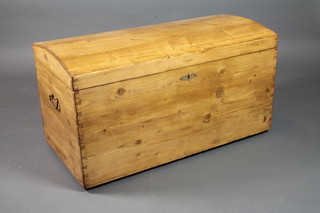 A 19th Century pine domed top trunk fitted end handles 21.5"h x 39"w x 20"d