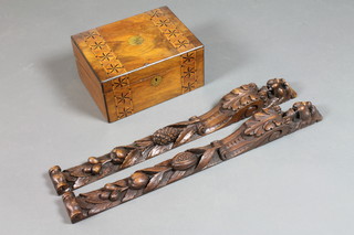 A mid Victorian figured walnut writing slope having parquetry decoration, the hinged top enclosed a fitted interior 6"h x 12"w x  9"d, together with a pair of 19th Century Flemish carved oak pilasters decorated lion masks and alpine fruit 