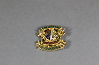 A gilt metal and enamelled Pullman Southern Railways Golden Arrow badge no.1226