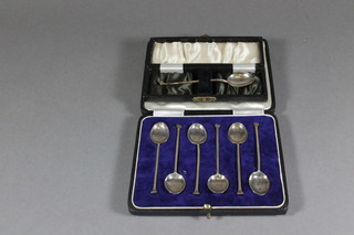 A set of 6 silver coffee spoons, Birmingham 1929 together with a  silver golfing spoon, Birmingham 1937, 1 ozs, cased