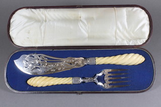 A pair of Victorian pierced silver plated fish servers with carved ivory handles, together with a bed warming pan etc