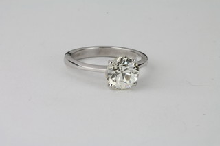 A lady's 18ct white gold solitaire engagement/dress ring set a  brilliant cut diamond, approx 1.88ct