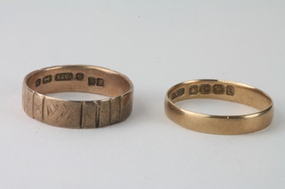 An 18ct gold wedding band and a 9ct gold wedding band