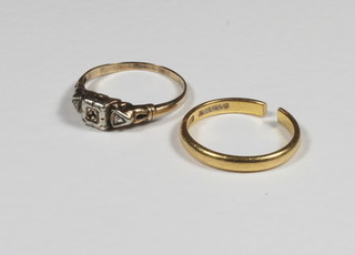 An 18ct gold wedding band, cut, and a gold dress ring set a diamond