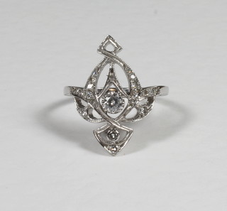 An Art Nouveau style pierced 18ct white gold dress ring set  diamonds