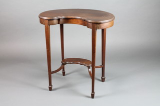 A Victorian mahogany 2 tier kidney shaped occasional table, raised on square tapering supports, spade feet 28"h x 26"w x  14"d
