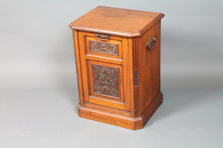 A late Victorian mahogany coal purdonium, the fall front drawer with foliate scroll relief carved decoration, raised on plinth base  23.5"h x 17.5"w