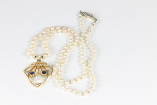 A Victorian brooch set pearls hung a 15ct gold pendant set  sapphires and demi-pearls