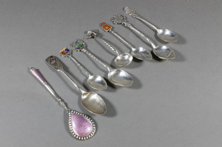 A 19th Century Russian silver spoon with niello decoration  marked B.C. 84 1870, a silver and enamelled spoon marked 990S, 4 silver souvenir spoons etc